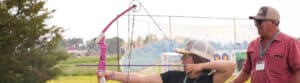 Dad & daughter on archery range